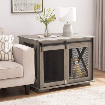 Farmhouse Barn-Door Dog Crate End Table in gray-wash wood with black metal mesh sliding doors and a dog inside