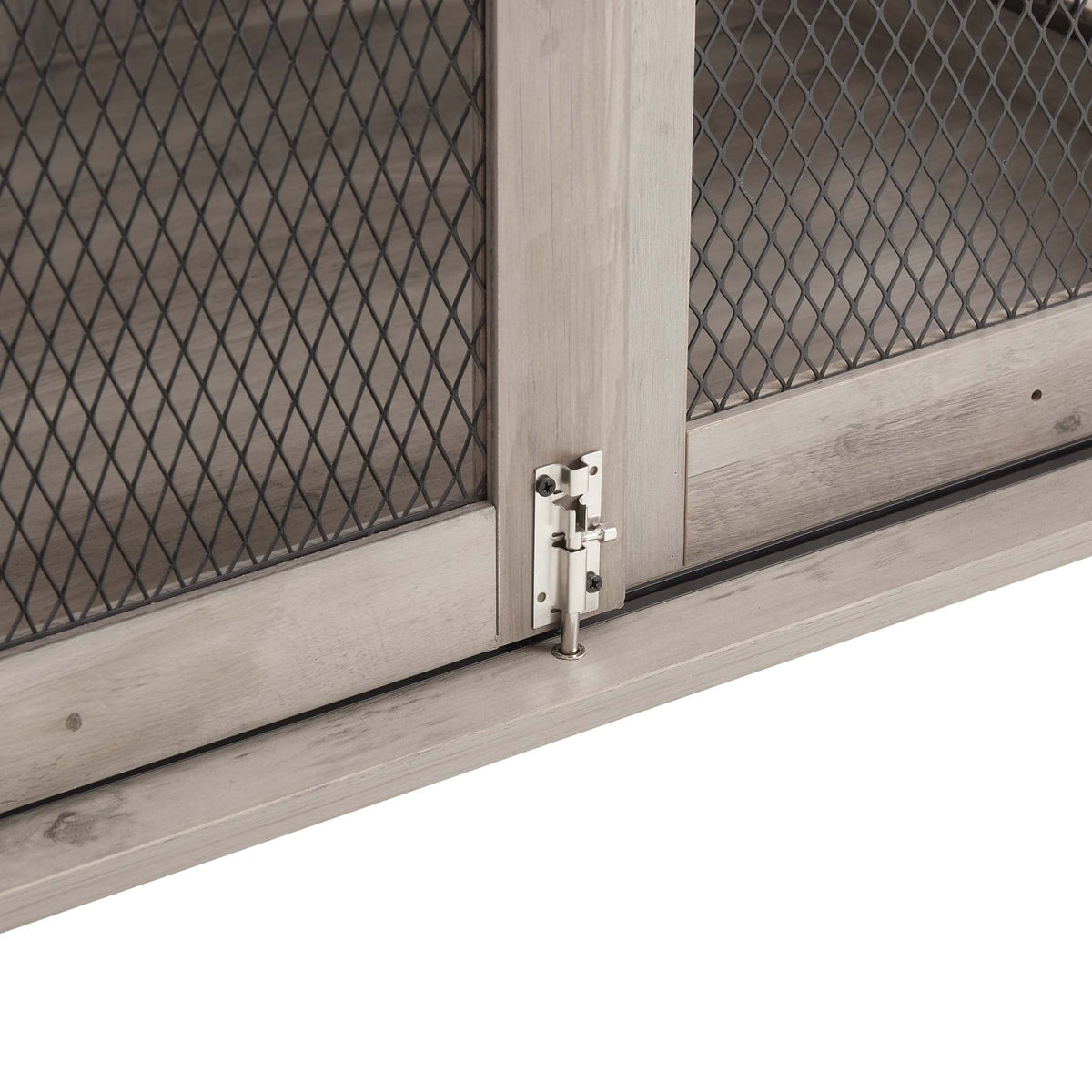 Farmhouse Barn-Door Dog Crate End Table with gray-wash wood panels, black diamond mesh, and a metal door latch
