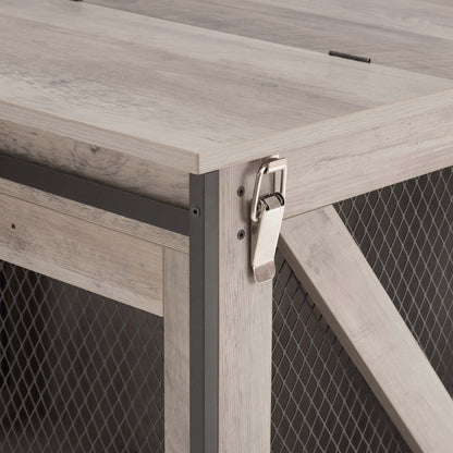 Farmhouse Barn-Door Dog Crate End Table in pale gray-wash wood, with dark metal mesh and a silver latch.