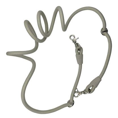 Hands-free Kismet dog leash worn around waist with metal hooks