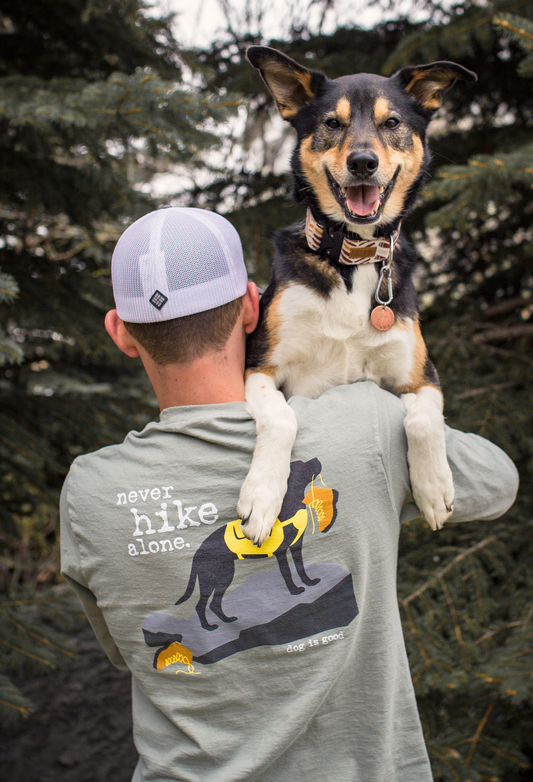Never Hike Alone long sleeve T-shirt with dog hiking graphic