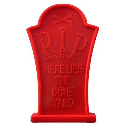 Headstone Ultra Durable Nylon Dog Chew Toy in bright orange, tombstone-shaped for aggressive chewers.