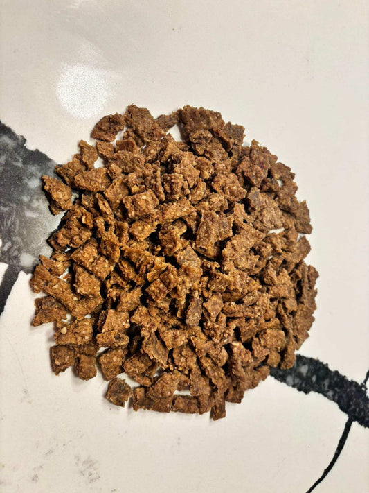 Organic Beef Dog Training Treats in small, soft, bite-sized brown morsels made with wholesome organic ingredients
