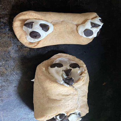 Organic cannoli dog treats in pink bakery box