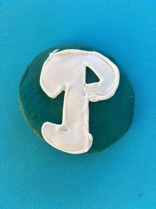 Organic football-shaped sports team cookies for dogs