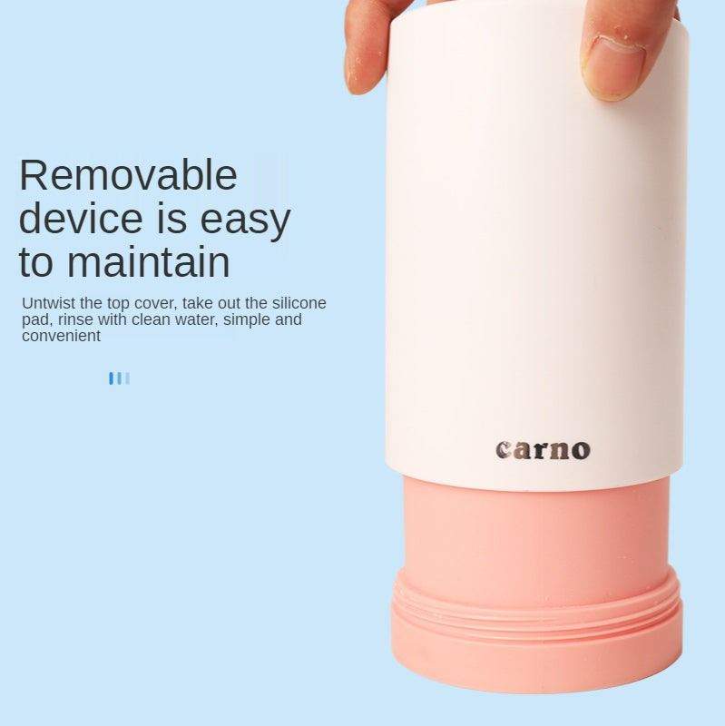 Paw Cleaner portable device with removable white cover and pink silicone base for easy cleaning and maintenance