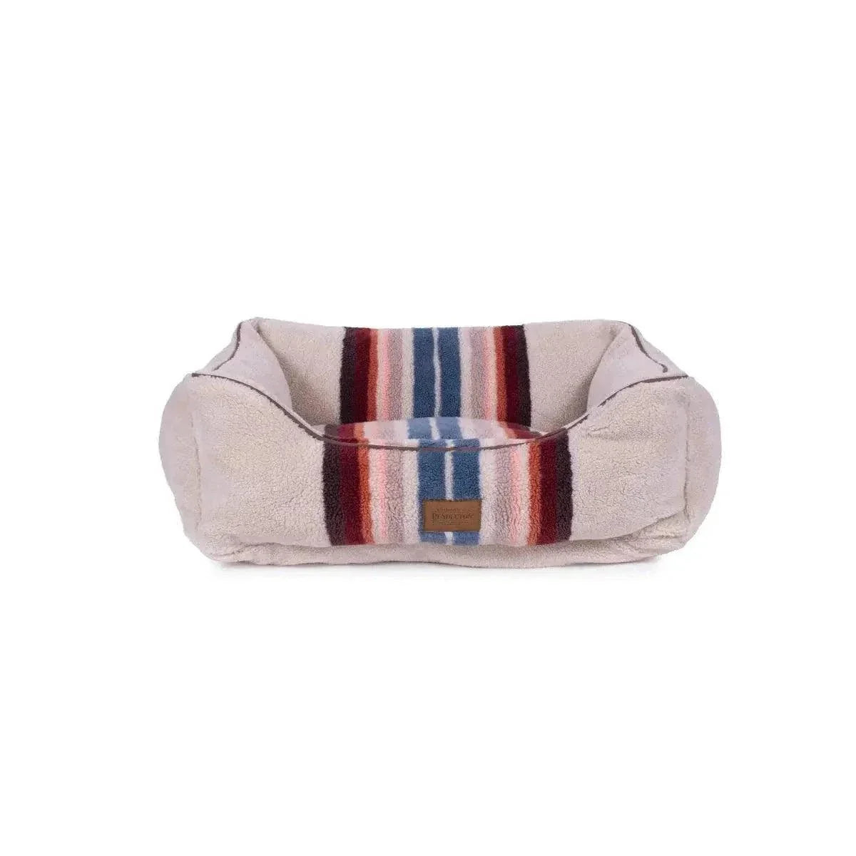 Pendleton Kuddler dog bed with plush bolsters and traditional patterns