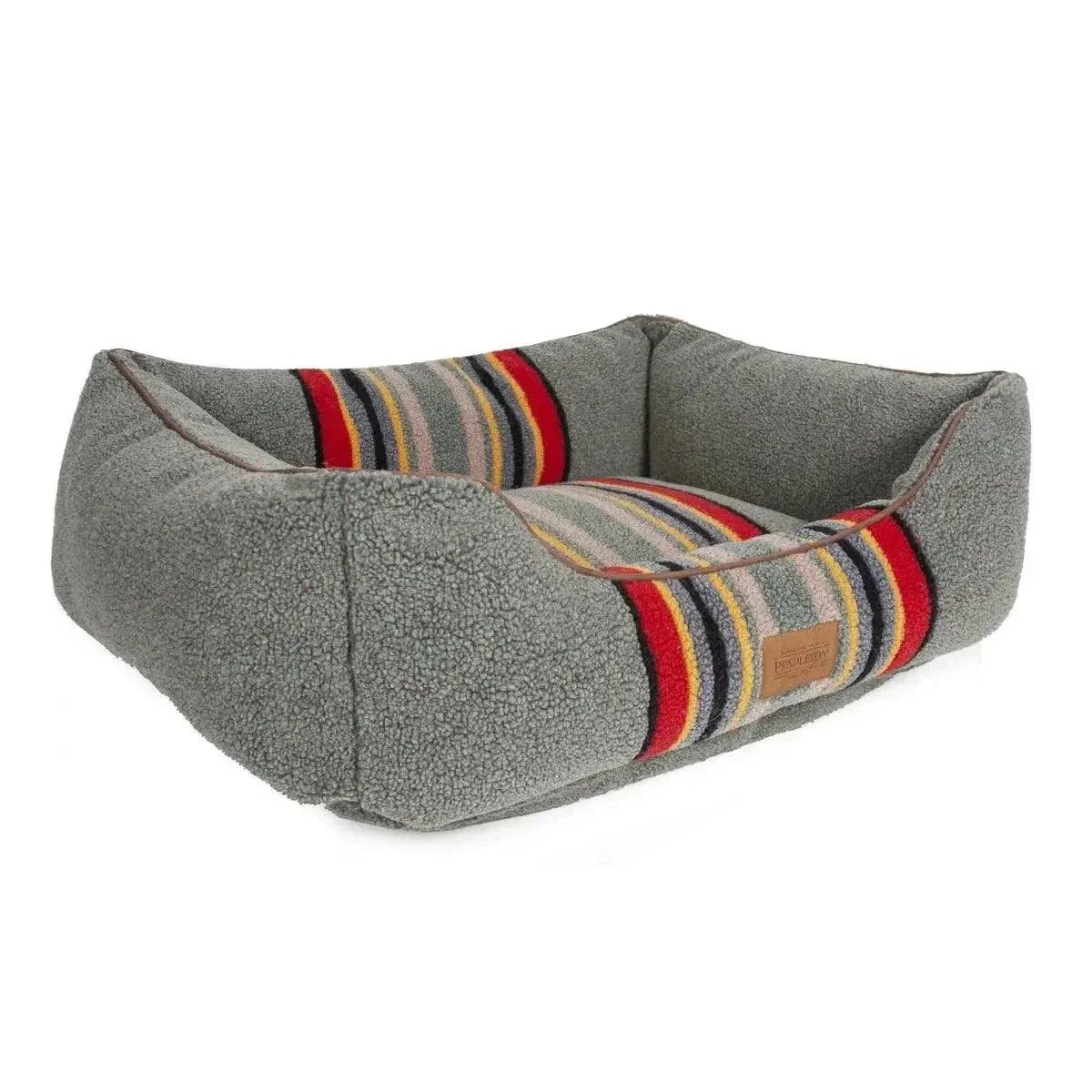 Pendleton Kuddler dog bed with traditional patterns and plush bolsters