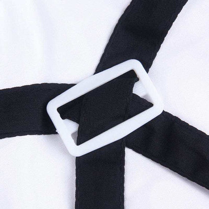 Close-up of Pet Suit with Bow Tie showing black straps crossing with white rectangular buckle on smooth white fabric