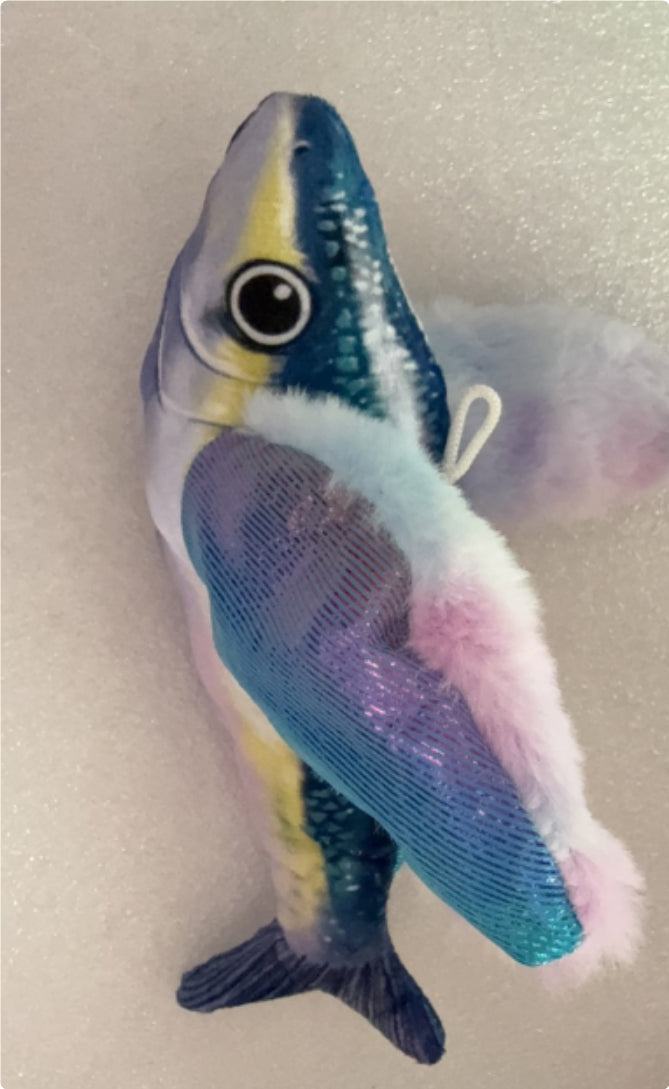 Plush Squeaky Animal Pet Toy shaped like a flying fish, with a blue and yellow body, large eye and fluffy pink wings