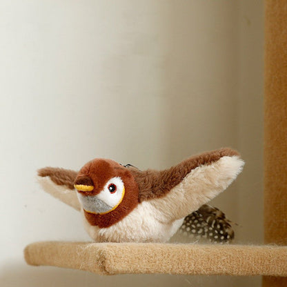 Plush Squeaky Animal Pet Toy shaped like a brown and cream bird, with spread wings, a yellow beak and spotted tail