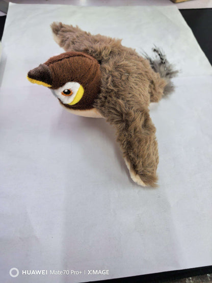 Plush Squeaky Animal Pet Toy shaped like a brown sparrow, with shaggy tan wings, a yellow beak and bright eyes