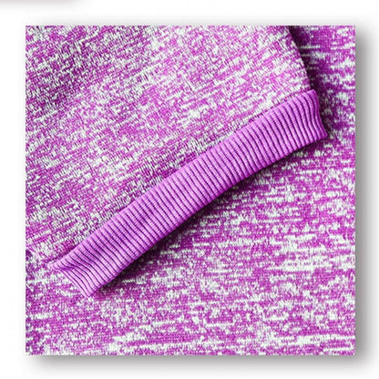 Close-up of purple fleece fabric on winter warm pet sweater sleeve edge