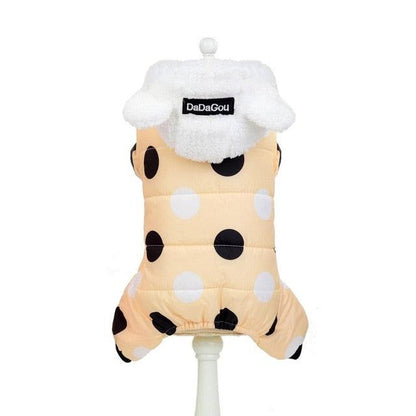 Waterproof dog snowsuit with large black and white polka dots, fleece-lined hoodie with ears, designed for small dogs in winter.