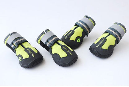 Waterproof boots for medium large dogs with reflective straps and anti-slip soles in black and yellow