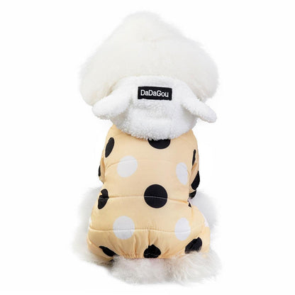 Small dog wearing waterproof polka dot fleece-lined snowsuit jumpsuit with hood and ears