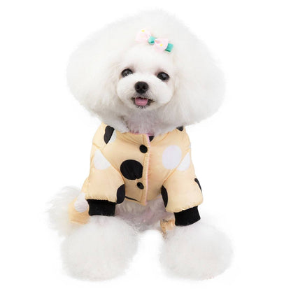 Small dog wearing waterproof polka dot fleece-lined snowsuit jumpsuit with legs and snap closure