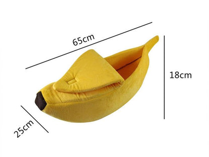 Yellow banana shaped pet bed for cats and small dogs with soft plush fabric and removable cushion
