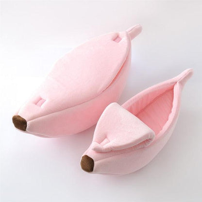 Pink banana-shaped pet beds made of soft plush fabric for cats and small dogs