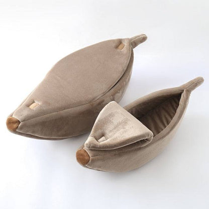 Brown banana-shaped soft plush pet bed for cats and small dogs