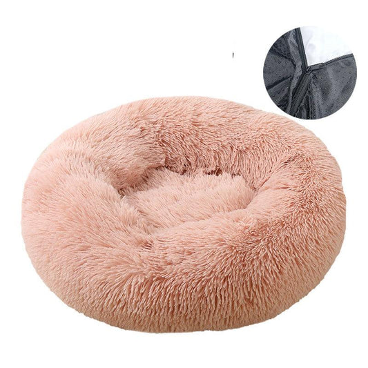 Round plush pet bed in soft pink velvet with shaggy texture and removable and washable cushion for easy cleaning