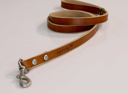 Handmade leather dog leash in brown with nickel-plated brass swivel snap and rivets