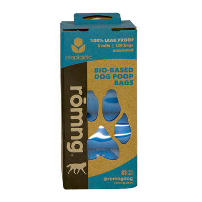 bio-based dog poop bags in eco-friendly biodegradable packaging with blue bags visible through a paw-shaped window