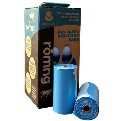 bio-based dog poop bags in eco-friendly recycled paper box with blue rolls for sustainable pet waste disposal