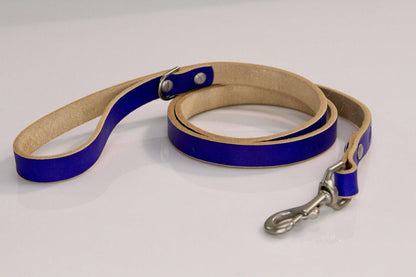 Blue handmade leather dog leash with metal swivel clasp on white background