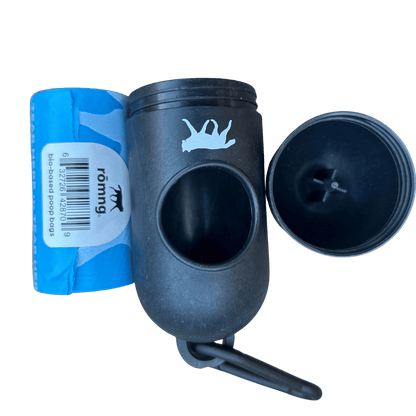 Bio-based dog poop bags roll with black dispenser and carabiner clip for eco-friendly pet waste cleanup