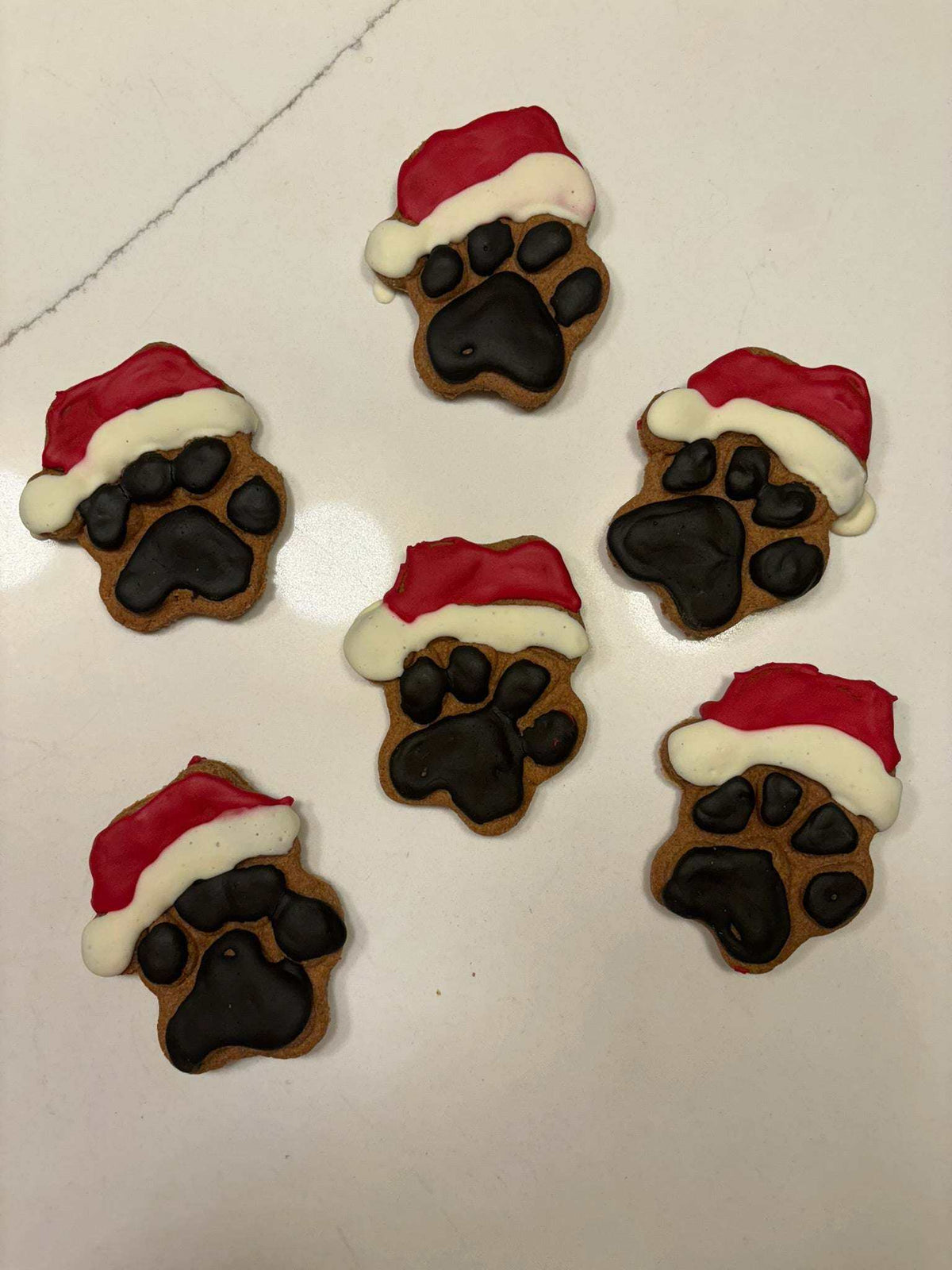 Santa Paws organic peanut butter dog treats in festive paw shape