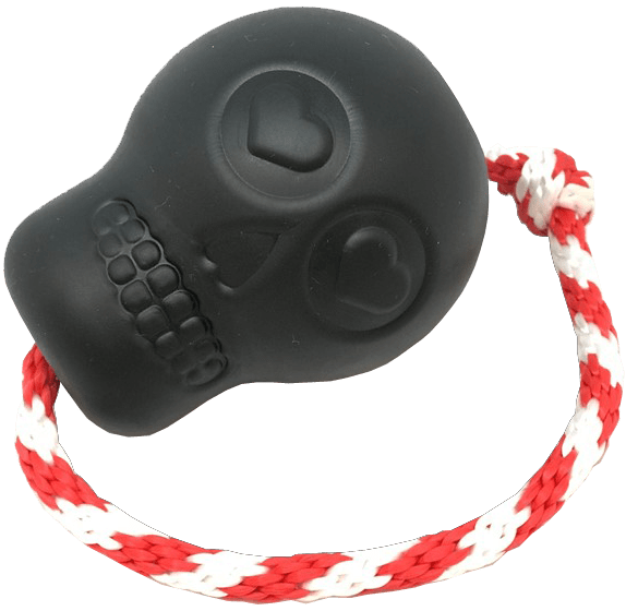 USA-K9 Magnum Skull durable black rubber dog chew toy with red and white rope treat dispenser and tug feature
