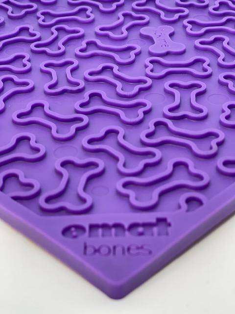 Purple Bones eMat lick mat for dogs with bone-shaped textured surface for anxiety relief and enrichment