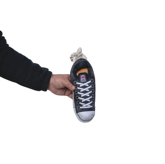 Black squeaky comfort plush sneaker dog toy with treat compartment and tug rope