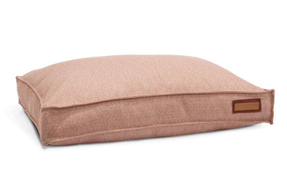 Lounger Pet Bed in Pittie Pink with durable, soft Sunbrella fabric and over-stuffed recycled fill for pet comfort