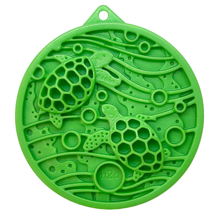 Green Water eCoin nylon dog enrichment Snacking Coin with turtle motif and textured cavities for mental stimulation and durable chewing