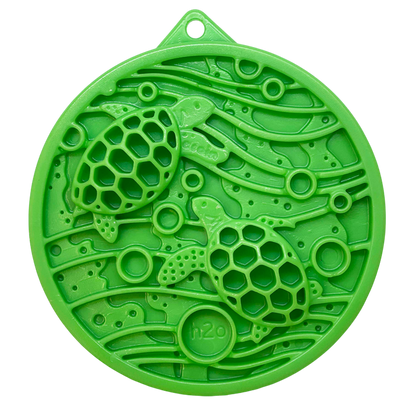 Green Water eCoin nylon dog enrichment Snacking Coin with turtle motif and textured cavities for mental stimulation and durable chewing