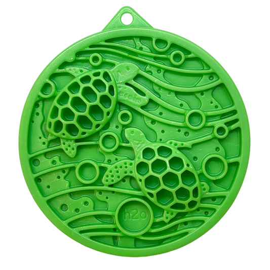 Green Water eCoin nylon dog enrichment Snacking Coin with turtle motif and textured cavities for mental stimulation and durable chewing