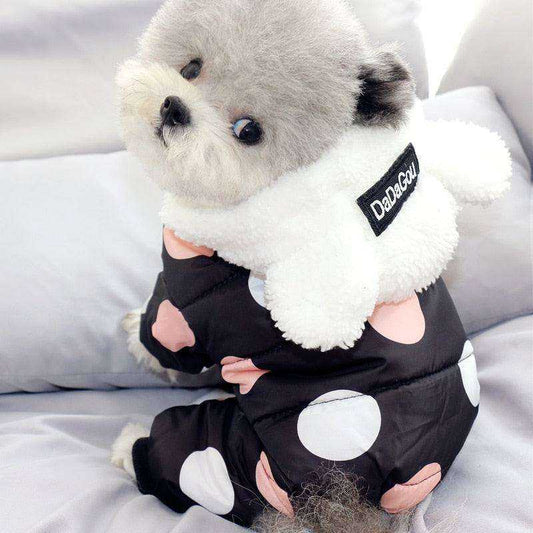 Waterproof Dog Snowsuit in black with large white and pink polka dots, fleece-lined white hood with ear details, full-body coverage