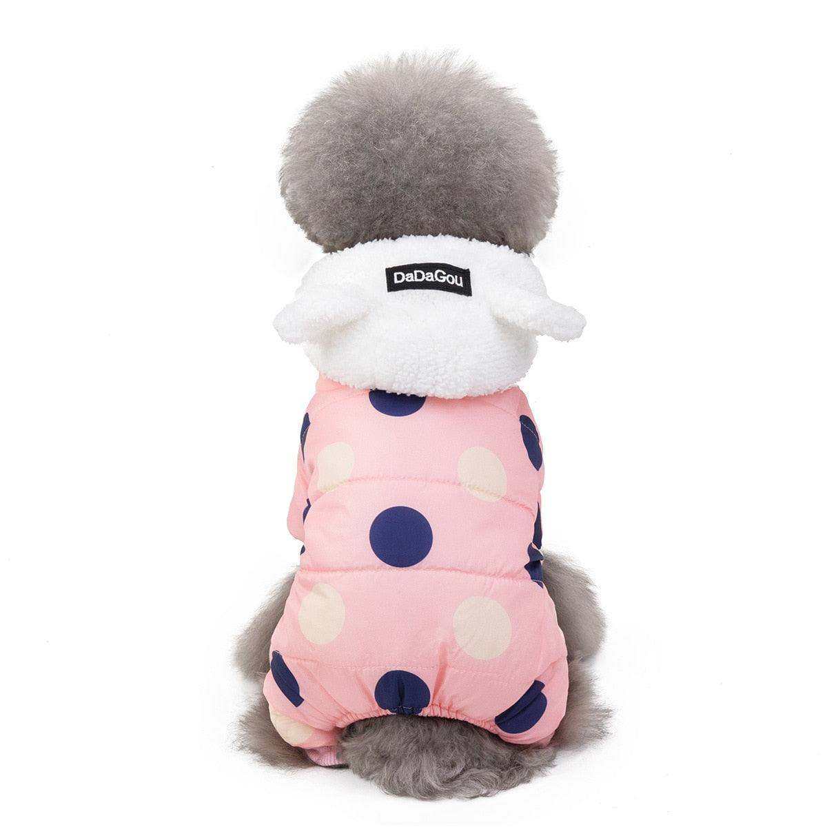 Waterproof Dog Snowsuit in pink with large navy and cream polka dots, fleece-lined hood with ear details on small dog